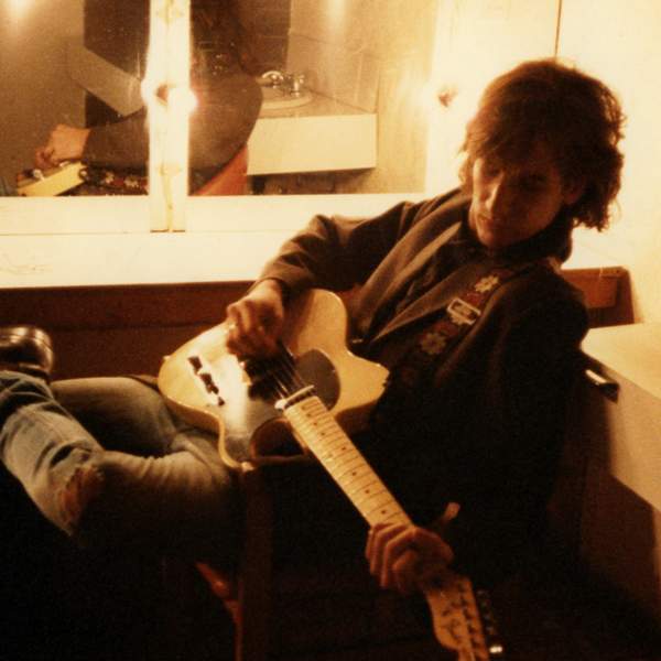 David McComb backstage in 1983