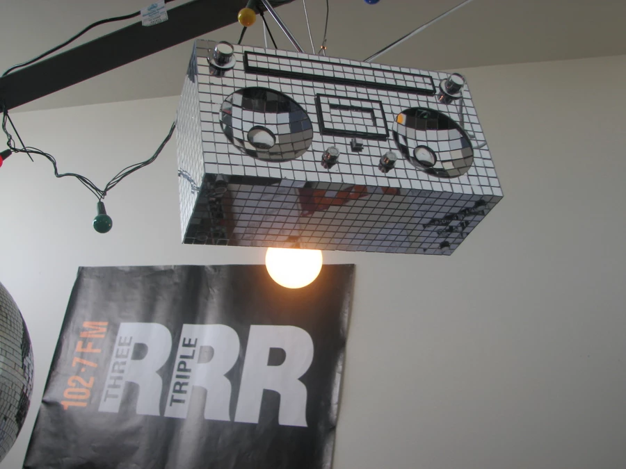 Generic disco radio with RRR poster